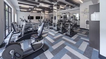 a gym with treadmills at The Hendrix, Georgia